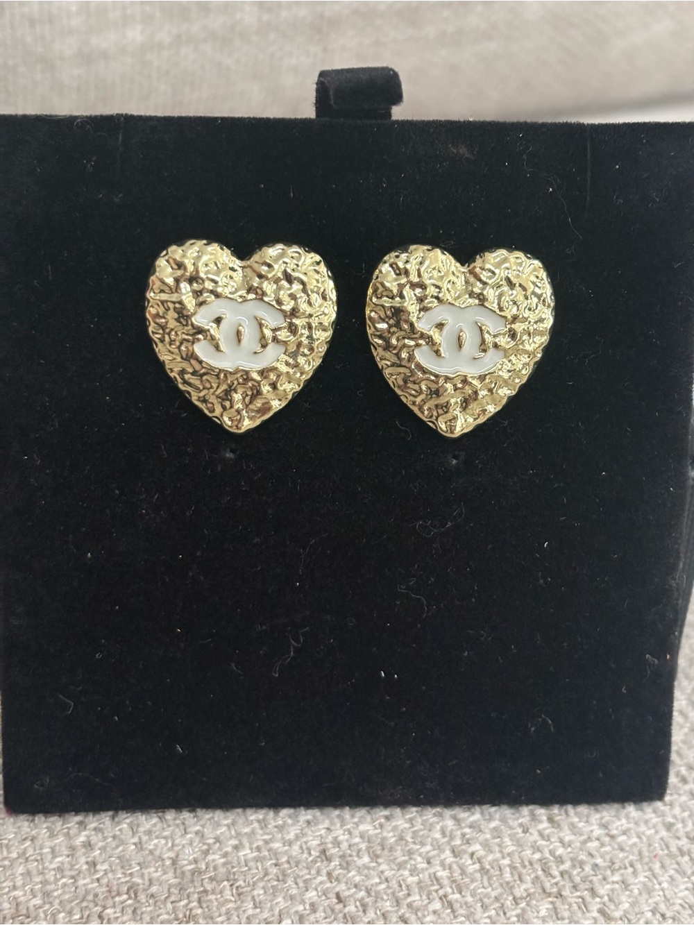 Hammered Gold Tone Heart Logo Stud Earrings with White Resin CC Accent